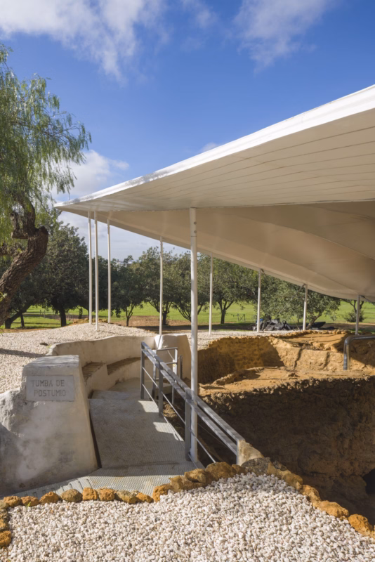 Interior of the canopy showing the perimeter plywood frieze and the inner ceiling textile membrane. Nd_Arquitectos. Carmona, Spain. Photo by Jesús Granada.